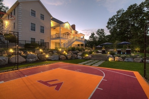 outdoor spaces design and installation Basketball Court construction in a backyard for a former athlete that wanted to bring his college love home in New York