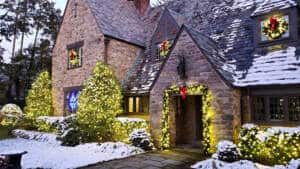 Brick cottage with beautifully bright Christmas lights