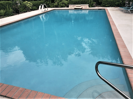 Cloudy above ground pool water in swimming pool