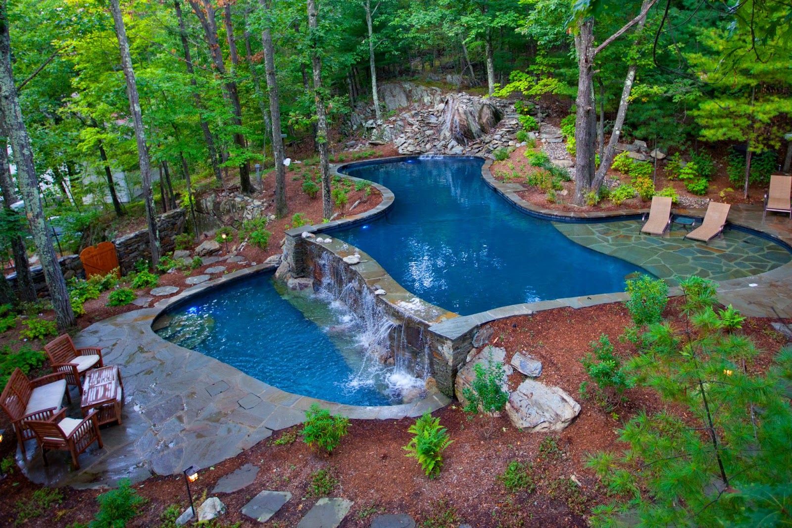 Swimming Pool in the Woods With Waterfall