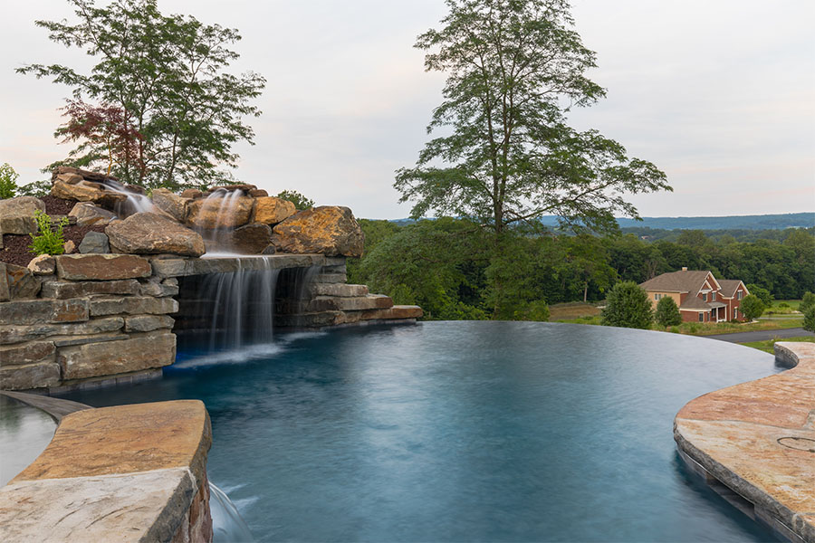 Custom infinity edge pool offers breathtaking views and unique features
